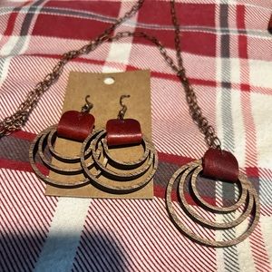 Beautiful handmade necklace and earrings. Woden and leather